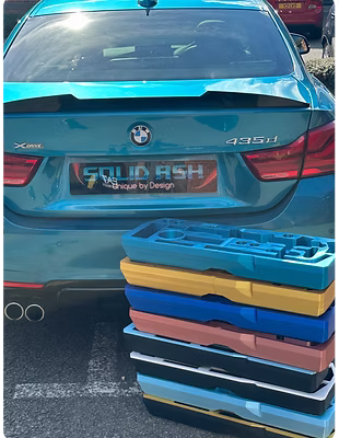 Stacked SOLIDASH organisers behind a BMW 435d